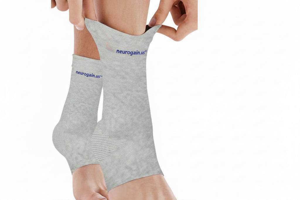 Gray ankle support brace with 'neurogain.us' branding on a white background
